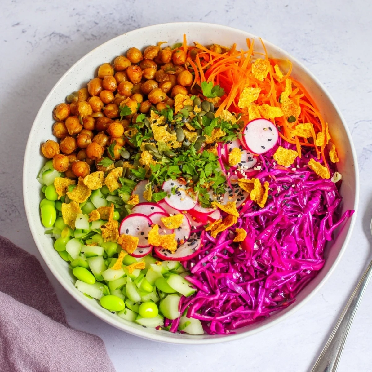 A close-up of a crunchy ASMR Snack Bowl overflowing with vibrant textures and colors.