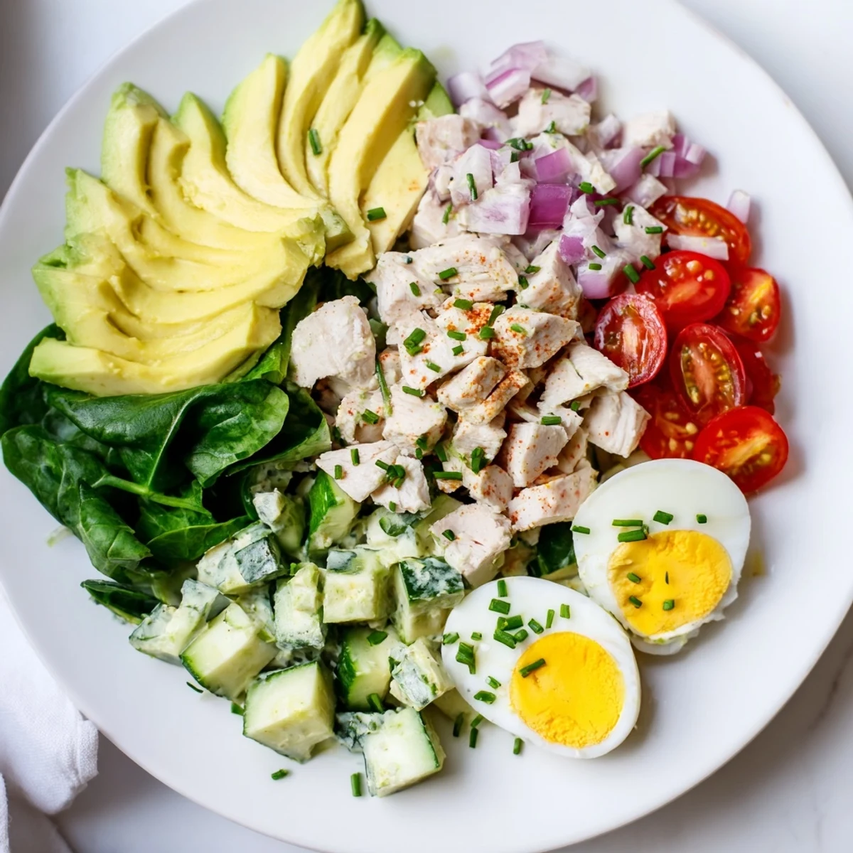 Fresh High-Protein Chicken and Egg Salad, perfectly chilled and ready for a satisfying lunch.