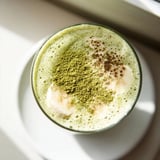 Refreshing Matcha Eggnog Collagen Breakfast Smoothie, a vibrant green, perfect for a quick and nutritious start.
