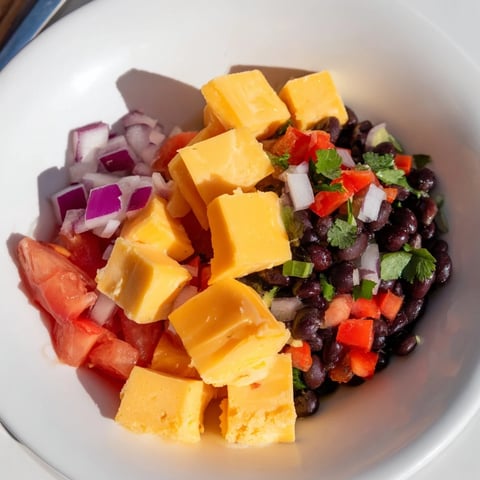 Fiery Pepper Jack cubes and fresh black bean salsa, a colorful and satisfying appetizer.
