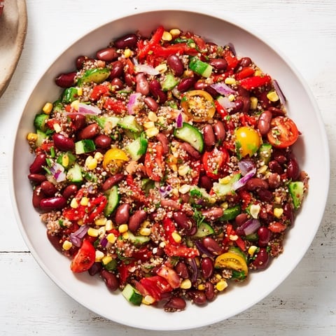 Vibrant Dense Bean Salad, a colorful mix of beans and seeds in a light, zesty dressing.