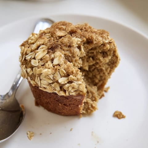 Soft and fluffy banana oat muffins, smelling of sweet banana and toasted oats