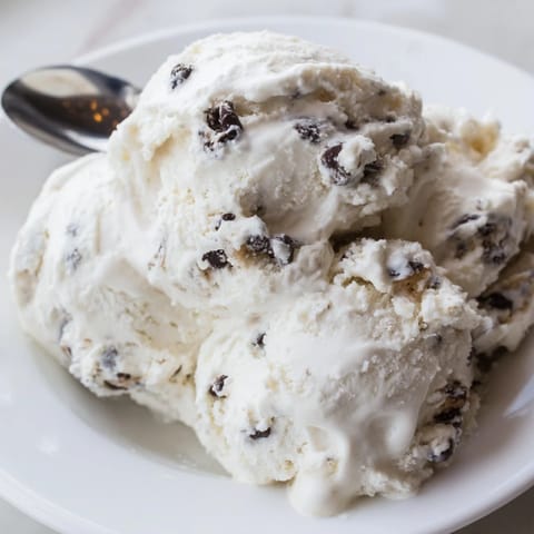 Indulge in Cottage Cheese Ice Cream with Cookie Dough, a rich, sweet delight.  
