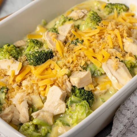 A creamy, cheesy Chicken & Broccoli Cheddar Bake, baked until crispy and golden, perfect comfort food.
