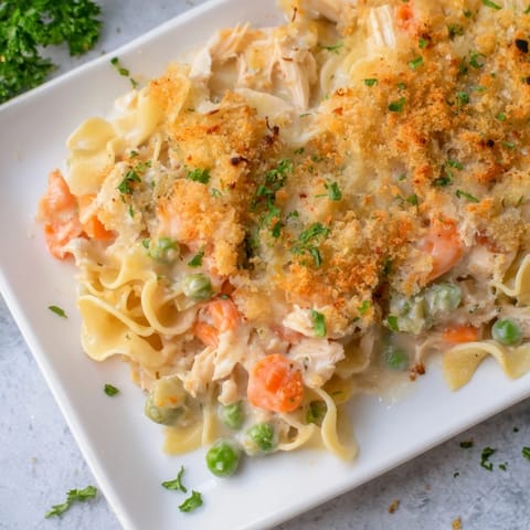 A close-up shot of the Baked Cream of Chicken Noodle Soup Pasta with a crispy breadcrumb topping.