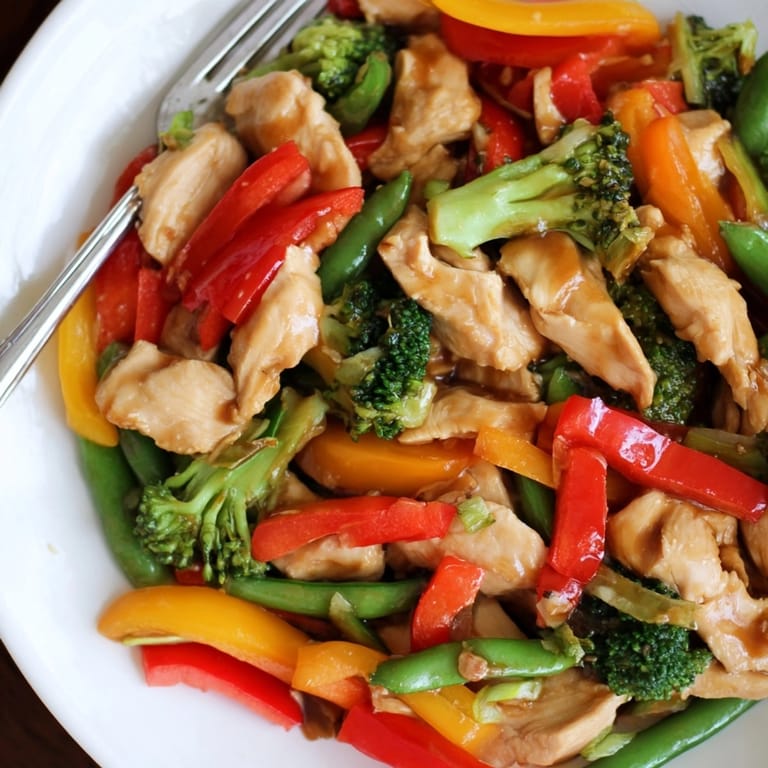 Homemade Chicken &amp; Veggie Stir-Fry: See crisp broccoli, colorful peppers coated in delicious sauce.