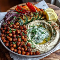 Roasted Crispy Chickpea Bowls bursting with vibrant grilled vegetables and creamy hummus.